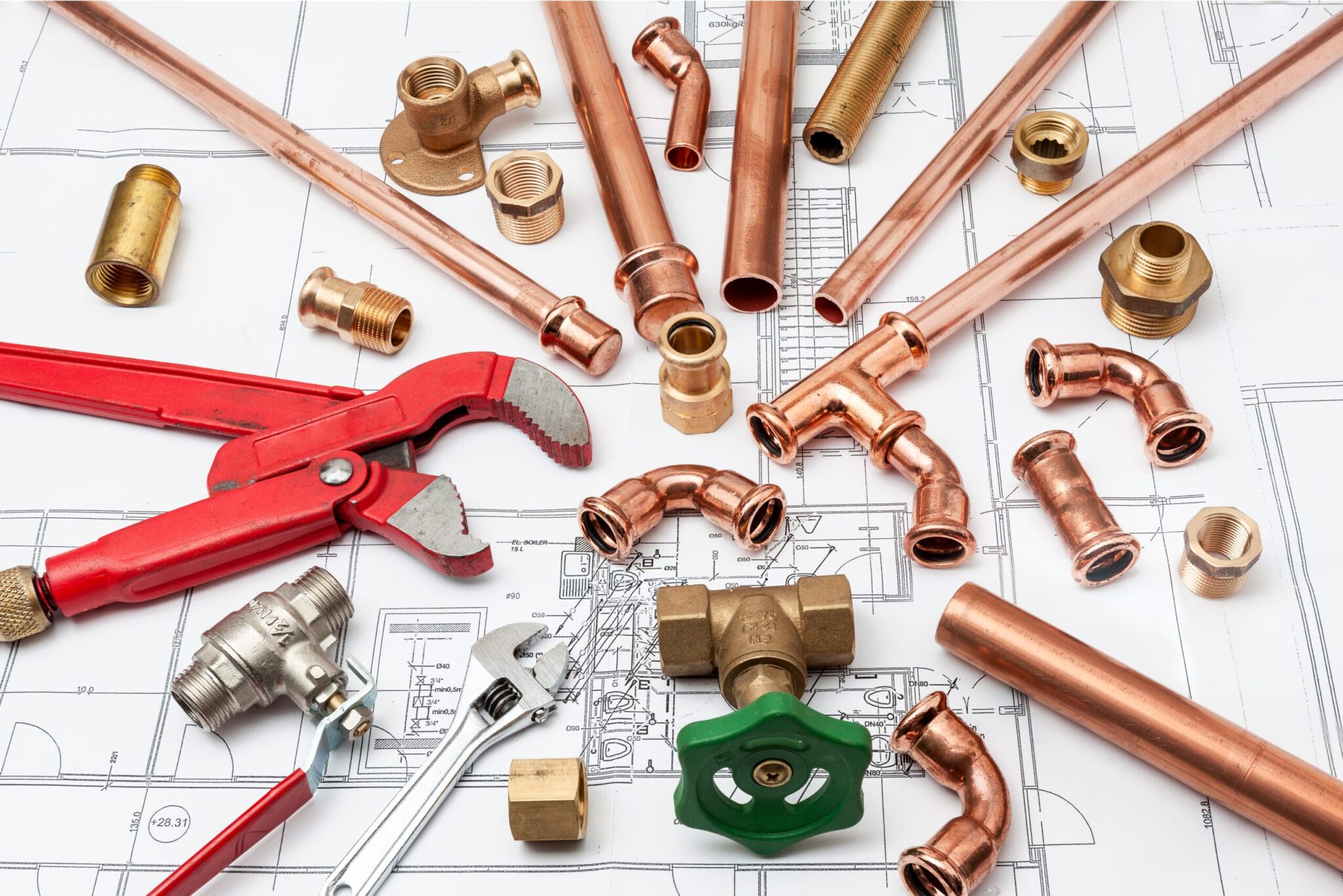 Copper pipes, fittings, valves, and plumbing tools in Greeley